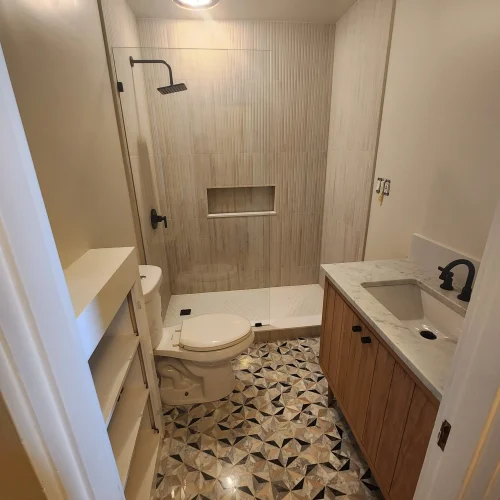 modern-bathroom-with-patterned-floor-tiles-and-walk-in-shower