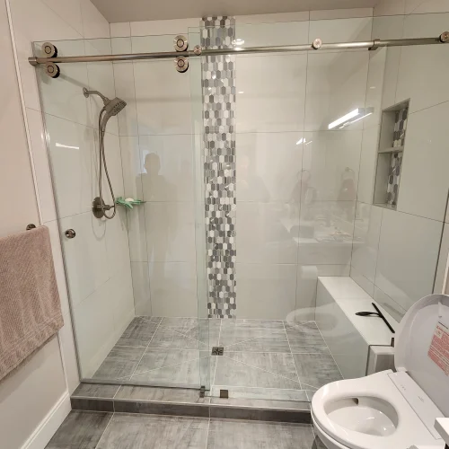 modern-bathroom-with-walk-in-shower-and-sliding-glass-door